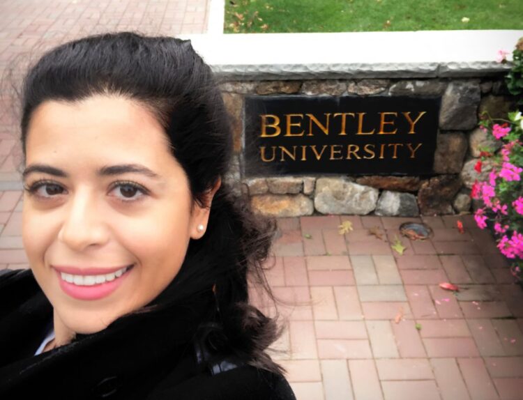 A selfie of Julide Etem in front of a Bradley University sign