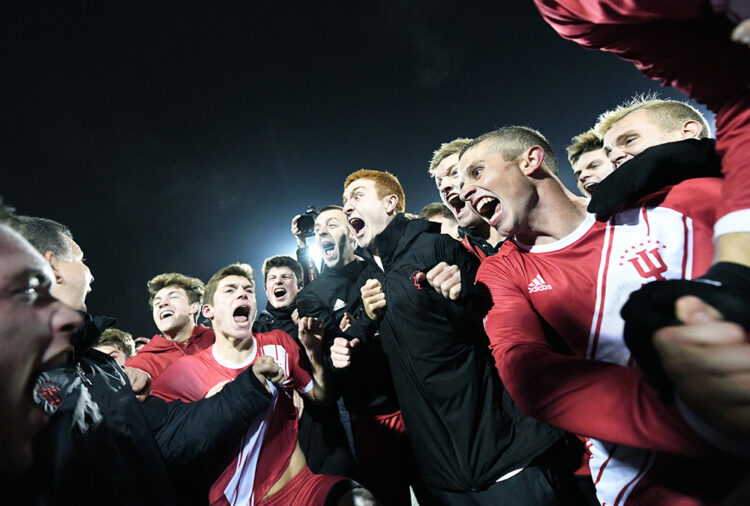 The Indiana Hoosiers celebrate after winning their NCAA quarterfinal match against Notre Dame at Bill Armstrong Stadium in Bloomington Ind., on Friday, Nov. 30, 2018.